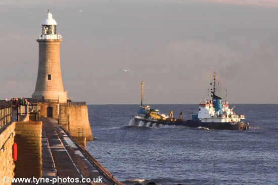 Dredger Cherry Sand pitching as it passed the lighthouse.