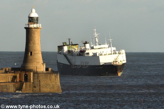 Car carrier City of Nordic swaying as it arrives past Tynemouth Lighthouse.