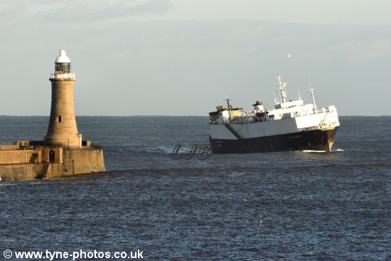 Car carrier City of Nordic swaying as it arrives past Tynemouth Lighthouse.