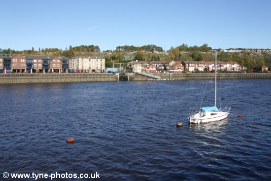 Boats moored on the River Tyne at Felling Shore .