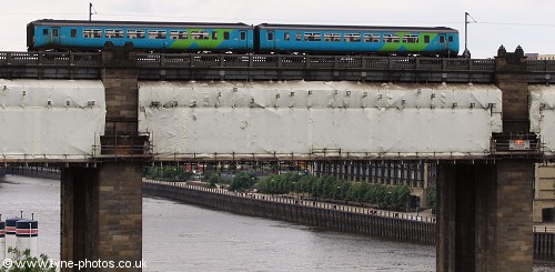 Passenger Train crossing the High Level Bridge heading north to Newcastle Central Station.