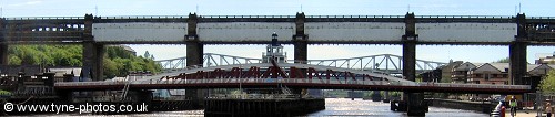 High Level Bridge complete with tarpaulins seen above the Swing Bridge.