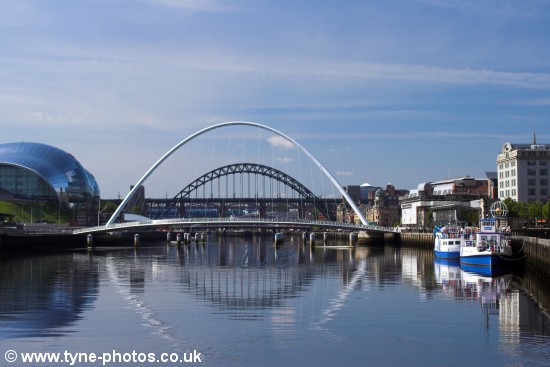 View of the Millennium Bridge with the other bridges seen in the background.