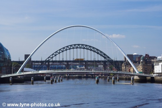 View of the Millennium Bridge with the other bridges seen in the background.