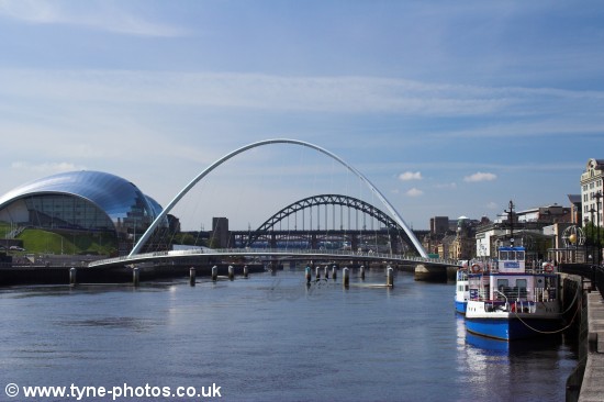 View of the Millennium Bridge with the other bridges seen in the background.