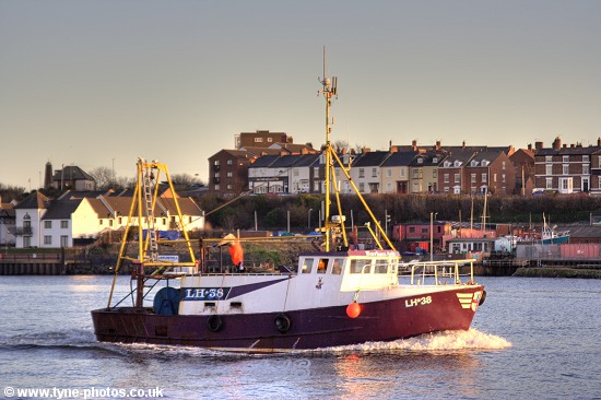 Fishing boat Barbara Anne sailing up the RiverTyne at sunset.