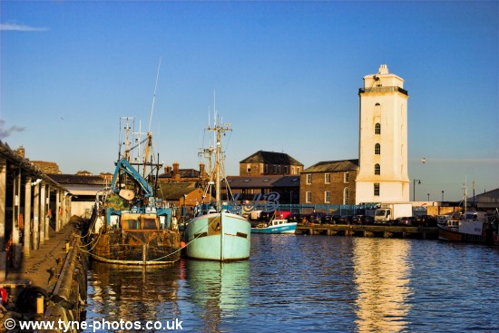 Fishing boats moored at the fish quay.
