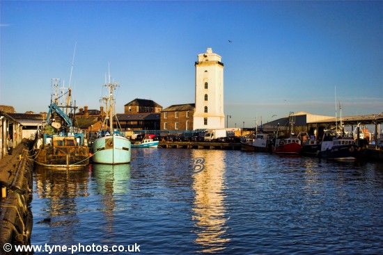 Fishing boats moored at the fish quay.