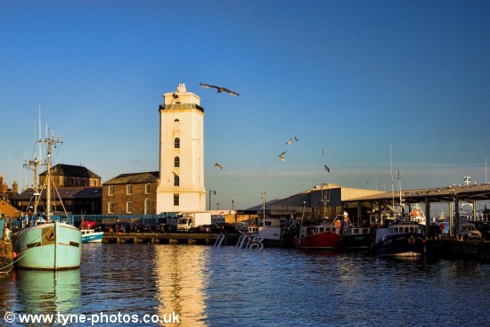 Fishing boats moored at the fish quay.