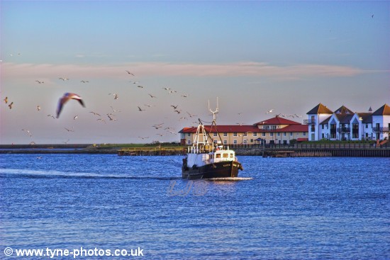 Fishing boat approaching North Shields Fish Quay.