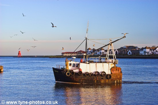 Fishing boat approaching North Shields Fish Quay.