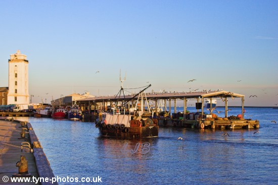 Fishing boat approaching North Shields Fish Quay.