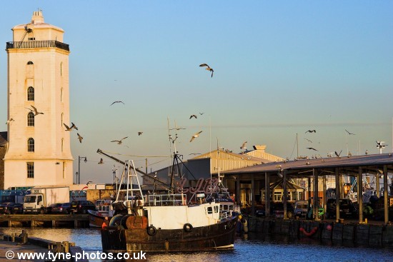 Fishing boat approaching North Shields Fish Quay.