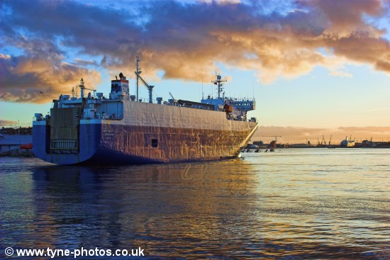 Car carrier City of Barcelona arriving in the River Tyne and passing North Shields Fish Quay.