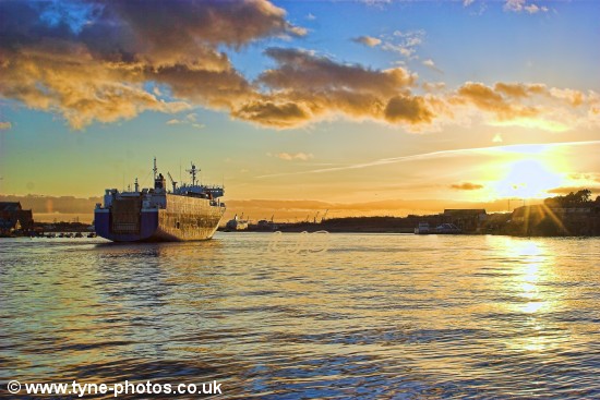 Car carrier City of Barcelona arriving in the River Tyne and passing North Shields Fish Quay.