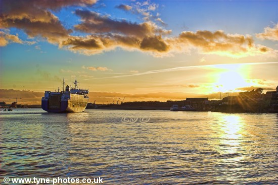 Car carrier City of Barcelona arriving in the River Tyne and passing North Shields Fish Quay.