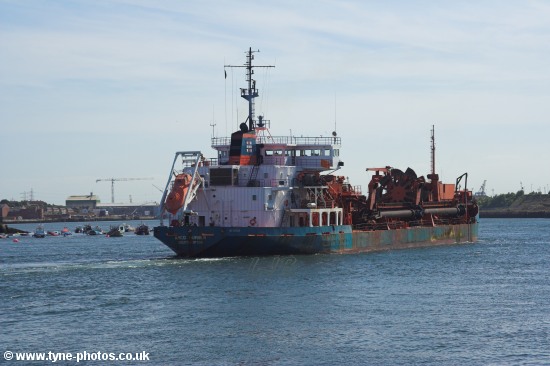 Dredger Arco Humber passing North Shields Fish Quay.