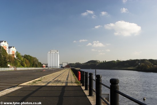 View along the Quayside to the old Spillers Flour Mill. This area used to be warehouses, now an empty car park.