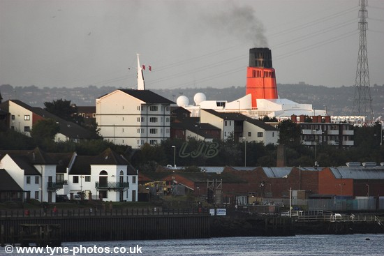 A last view of the famous red funnel towering above the houses at South Shields.