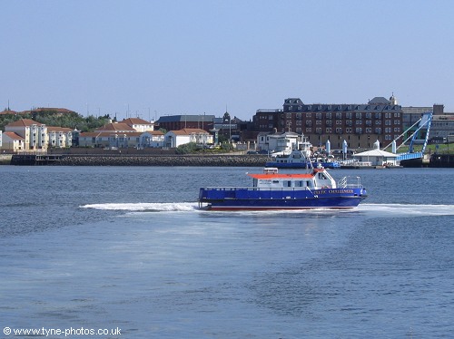 Boat exiting the marina and  preparing to head upstream.