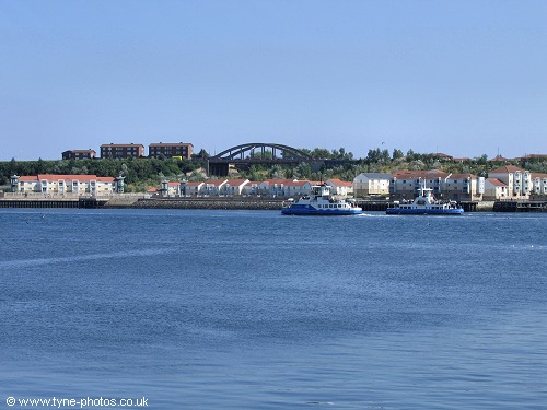 The Shields Ferries - one on crossing duty and one returning from further up the river.