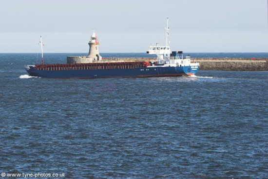 Cargo Ship Sea Box passing South Shields Lighthouse and Pier..