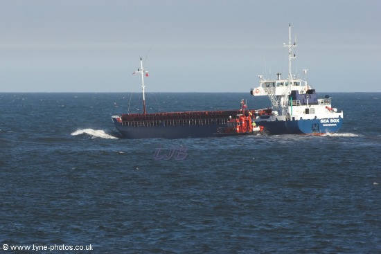 Cargo Ship Sea Box sailing into choppy seas off the River Tyne.