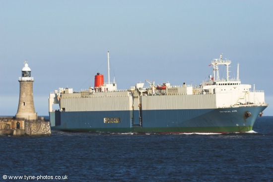 Crystal Ace passing Tynemouth Pier and Lighthouse.