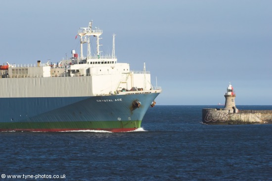 Crystal Ace passing South Shields Pier and Lighthouse.