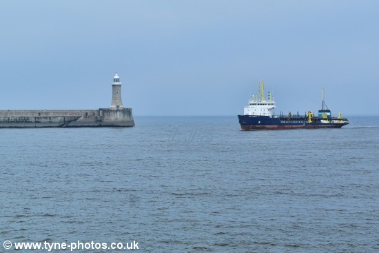 Dredger UKD Marlin working at the mouth of the River Tyne.