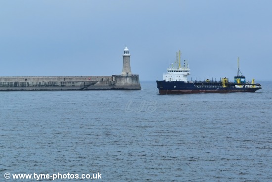 Dredger UKD Marlin working at the mouth of the River Tyne.