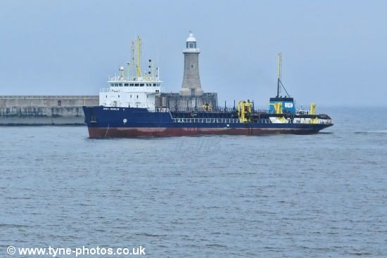 Dredger UKD Marlin working at the mouth of the River Tyne.