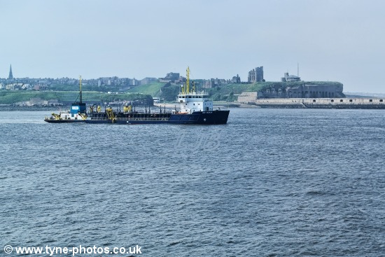 Dredger UKD Marlin working at the mouth of the River Tyne.