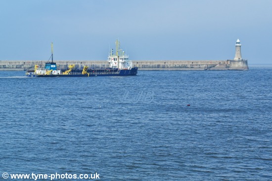 Dredger UKD Marlin working at the mouth of the River Tyne.