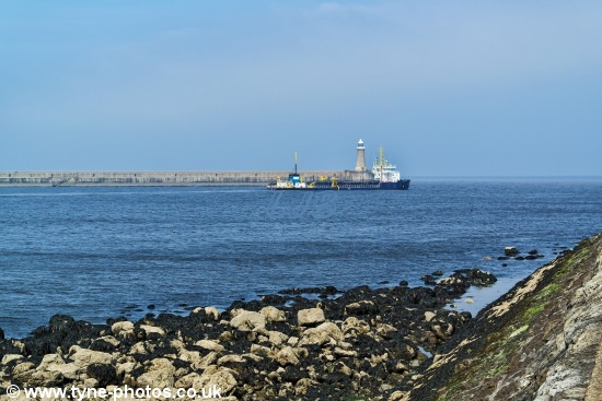Dredger UKD Marlin working at the mouth of the River Tyne.