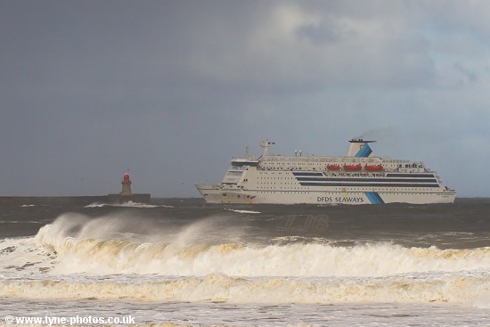 Car and Passenger Ferry, King of Scandinavia, entering the River Tyne in rough seas.