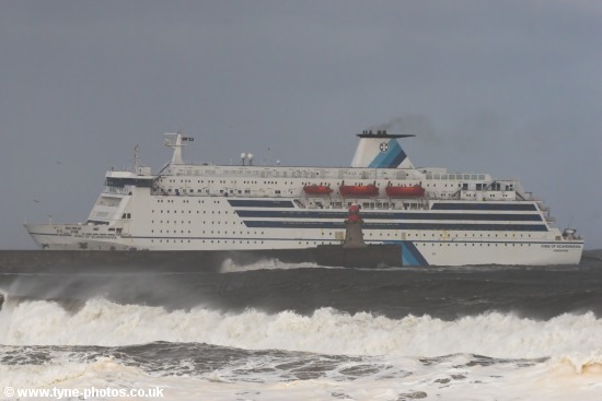 Car and Passenger Ferry, King of Scandinavia, entering the River Tyne in rough seas.