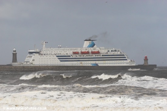 Car and Passenger Ferry, King of Scandinavia, entering the River Tyne in rough seas.