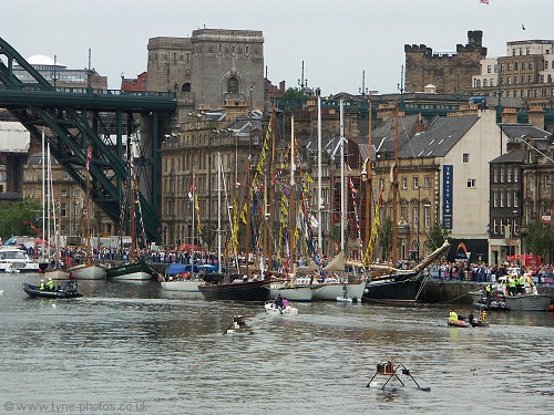 Tall ships moored at the Quayside near the Tyne Bridge.