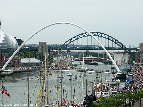 Crowds packed the Quayside and Millennium Bridge to see the ships.