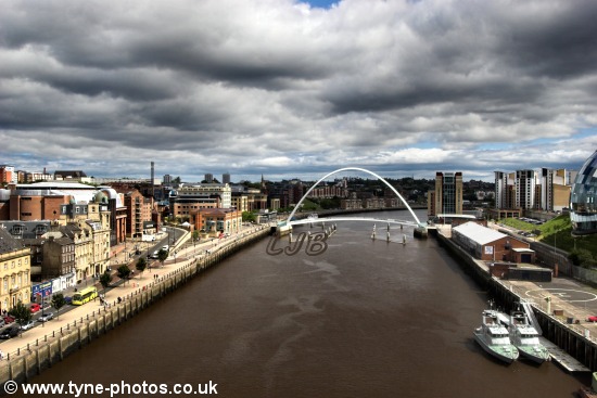 View of the Millennium Bridge on a cloudier day.
