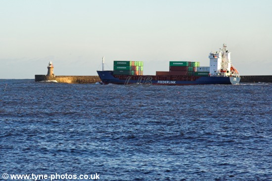 Feederlink cargo ship passing South Shields Pier.
